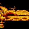 golden statue of lord brahma vishnu and siva