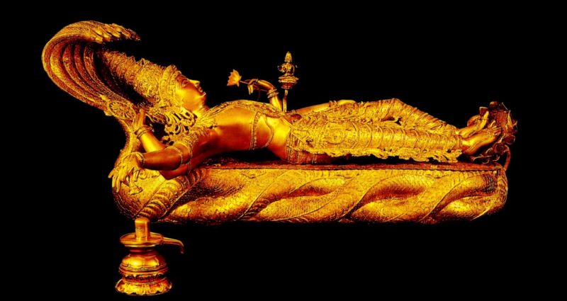 golden statue of lord brahma vishnu and siva