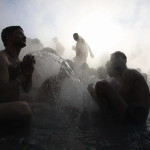 Hindu devotees bathe in a hot spring on the banks of the Satluj river on the occasion of the "Makar Sankranti" festival at Tatapani, in the northern Indian state of Himachal Pradesh.