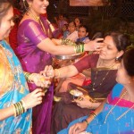 Women exchange Sankranti greetings with Haldi Kumkum