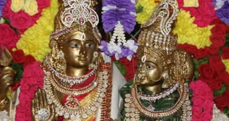 Siva Parvati statue crown flowers